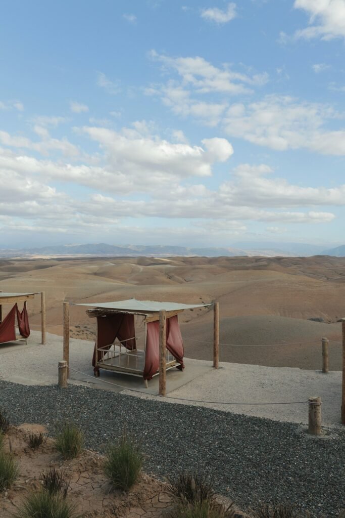Lounge beds at a camp overlooking the Agafay desert near Marrakech