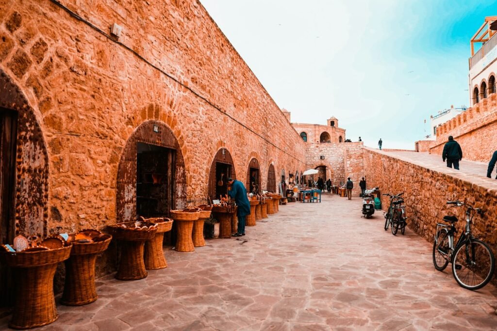 Stone ramparts and arcades in Essaouira, the walled port town of the Essaouira day trip from Marrakech